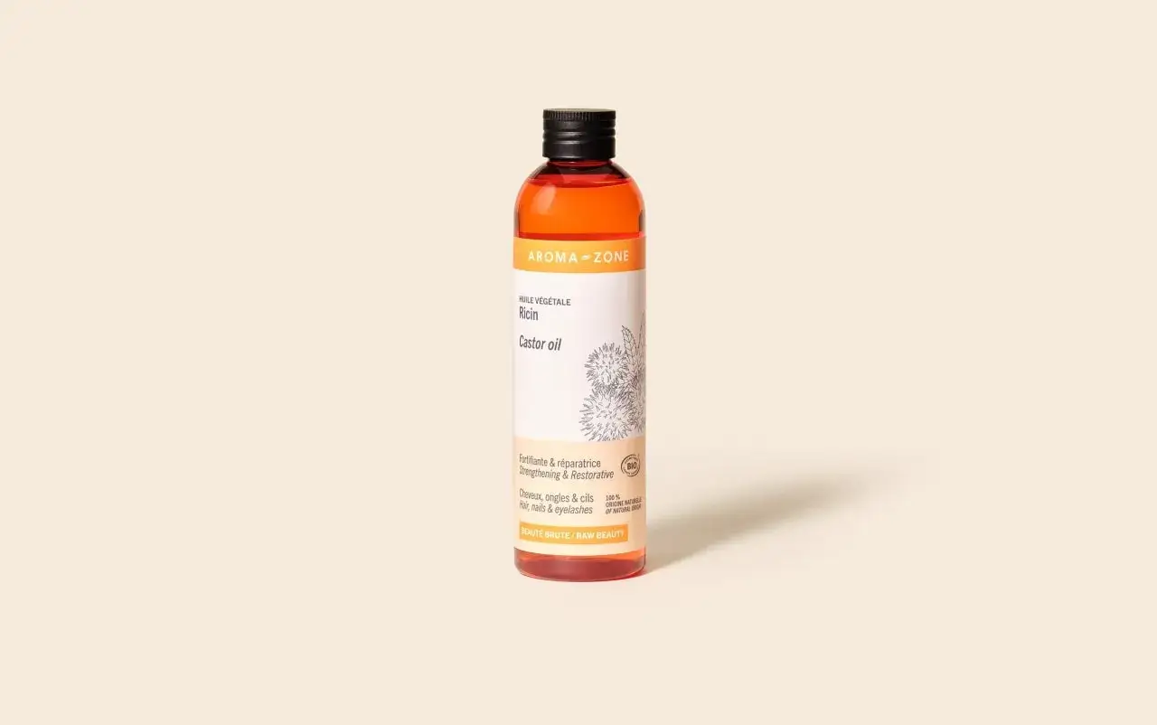 Bouteille d'huile de ricin Aroma-Zone, id&eacute;ale pour d&eacute;couvrir les bienfaits de l'huile de ricin pour les cheveux, ongles et cils.